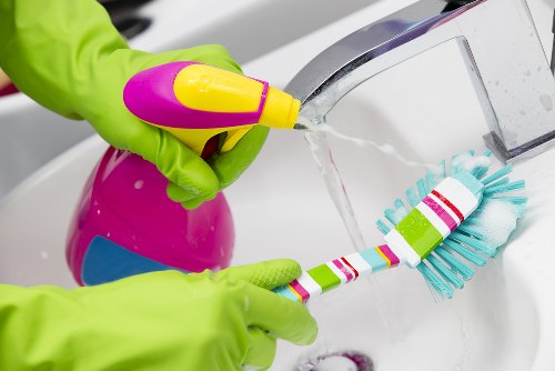 Cleaner in Docklands maintaining a bright residential interior
