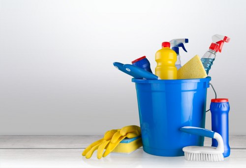 Cleaner maintaining a tidy kitchen and living area in Docklands